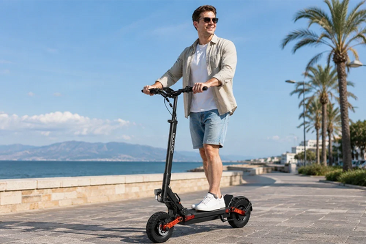 Smiling man riding JOYOR foldable electric scooter along sunny seaside coastal promenade with palm trees, outdoor leisure riding scene